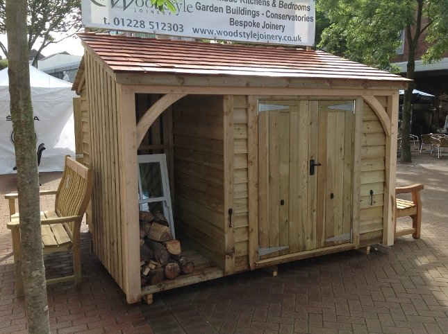 Woodstore with bike shed